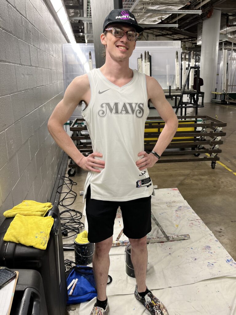Harvey Dunn backstage at the American Airlines Center ready to perform for a halftime show for the Dalla Mavericks