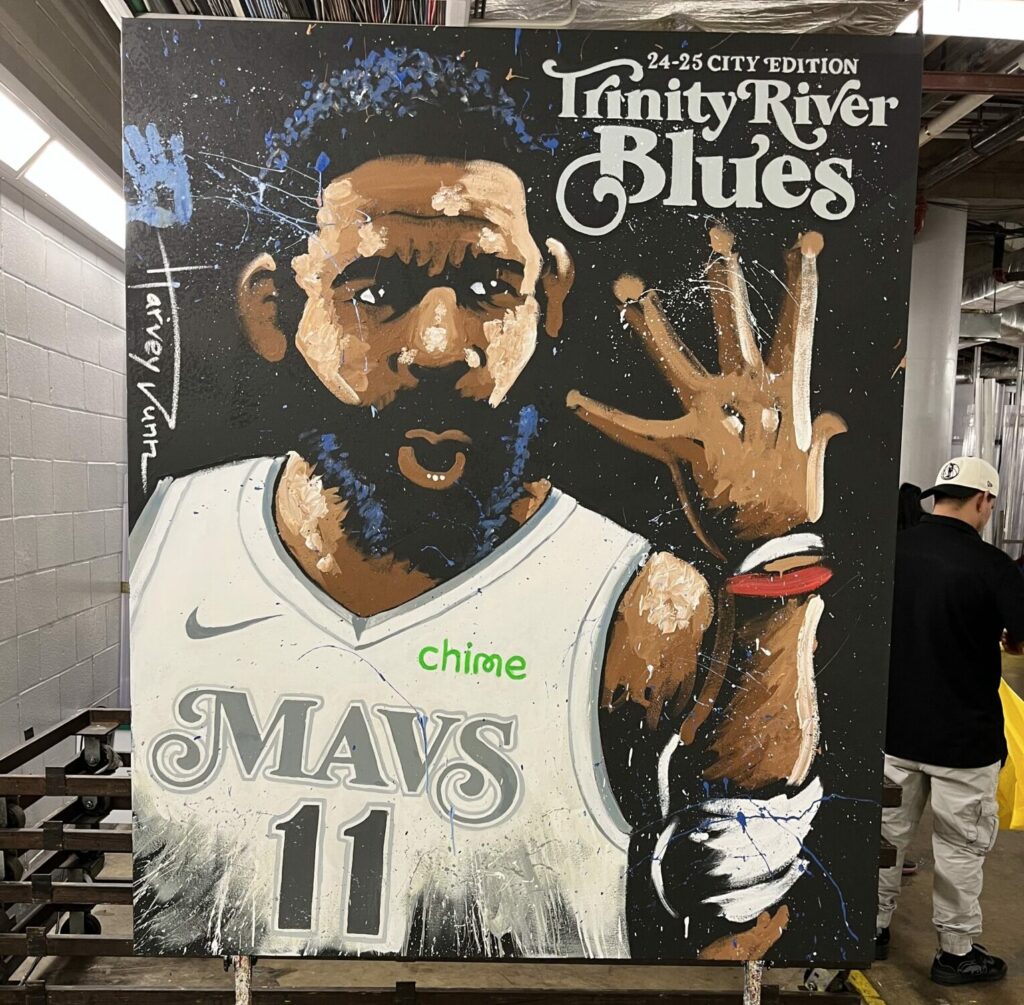 A portrait of Kyrie Irving performed during a halftime show by Harvey Dunn of PaintJam!